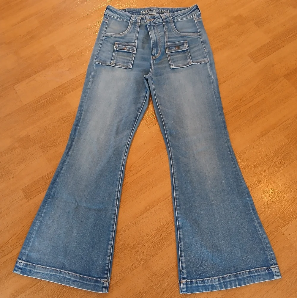 ISO IN SEARCH OF American Eagle Super High Rise Flare Jeans - Picture 1 of 7
